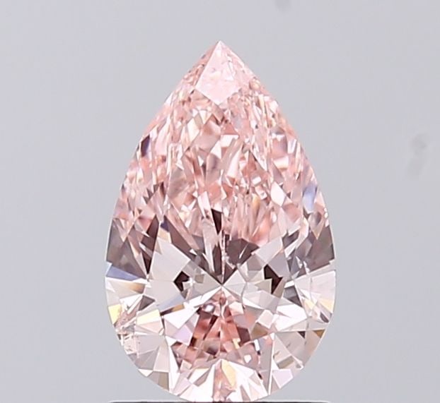 Loose Diamond - PEAR 1.0ct Fancy Vivid Pink SI2: Loose Diamond - PEAR 1.0ct Fancy Vivid Pink SI2 Source: This is a real non-mined Diamond that has been grown in a lab Shape: PEAR Carats: 1.0 Color: Fancy Vivid Pink Certification: IGI Video: