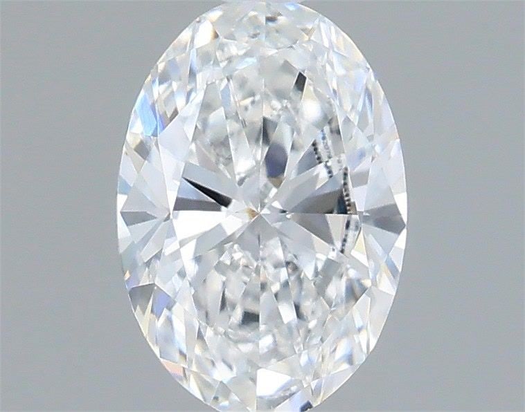 Loose Diamond - OVAL 0.76ct D VVS2: Loose Diamond - OVAL 0.76ct D VVS2 Source: This is a real non-mined Diamond that has been grown in a lab Shape: OVAL Carats: 0.76 Color: D Clarity: VVS2 Certification: IGI Video: