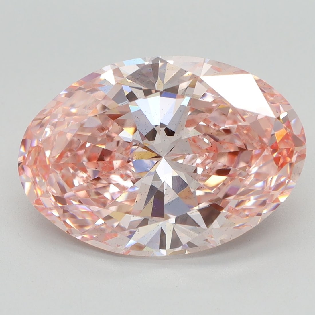 Loose Diamond - OVAL 5.09ct Fancy Vivid Pink SI1: Loose Diamond - OVAL 5.09ct Fancy Vivid Pink SI1 Source: This is a real non-mined Diamond that has been grown in a lab Shape: OVAL Carats: 5.09 Color: Fancy Vivid Pink Certification: IGI Video: