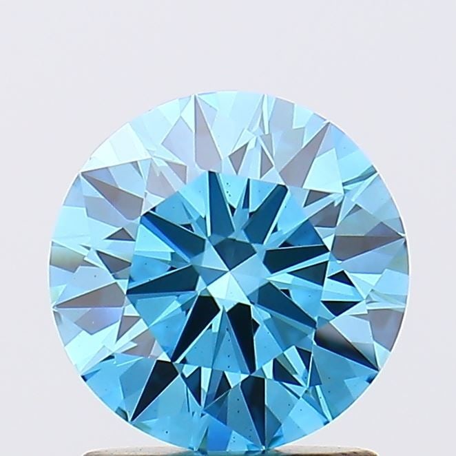 Ideal Loose Diamond - ROUND 1.42ct Fancy Vivid Blue VS1: Ideal Loose Diamond - ROUND 1.42ct Fancy Vivid Blue VS1 Source: This is a real non-mined Diamond that has been grown in a lab Shape: ROUND Carats: 1.42 Color: Fancy Vivid Blue Certification: IGI Video