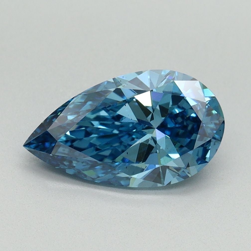 Loose Diamond - PEAR 1.51ct Fancy Vivid Blue VS2: Loose Diamond - PEAR 1.51ct Fancy Vivid Blue VS2 Source: This is a real non-mined Diamond that has been grown in a lab Shape: PEAR Carats: 1.51 Color: Fancy Vivid Blue Certification: IGI Video: