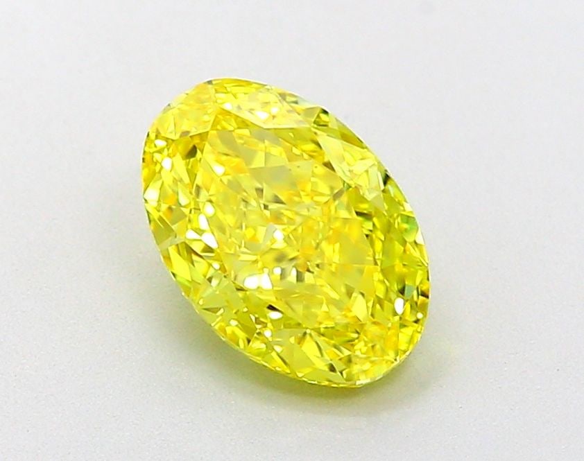 Loose Diamond - OVAL 2.05ct Fancy Vivid Yellow VVS1: Loose Diamond - OVAL 2.05ct Fancy Vivid Yellow VVS1 Source: This is a real non-mined Diamond that has been grown in a lab Shape: OVAL Carats: 2.05 Color: Fancy Vivid Yellow Certification: IGI Video: