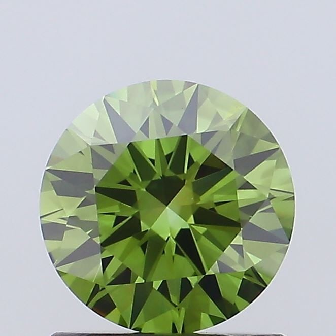 Ideal Loose Diamond - ROUND 0.99ct Fancy Vivid Green VVS2: Ideal Loose Diamond - ROUND 0.99ct Fancy Vivid Green VVS2 Source: This is a real non-mined Diamond that has been grown in a lab Shape: ROUND Carats: 0.99 Color: Fancy Vivid Green Certification: IGI Vi
