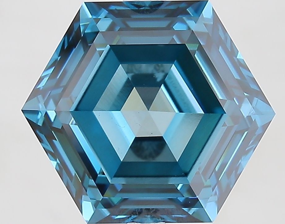 Loose Diamond - HEXAGONAL 5.11ct Fancy Vivid Blue VS1: Loose Diamond - HEXAGONAL 5.11ct Fancy Vivid Blue VS1 Source: This is a real non-mined Diamond that has been grown in a lab Shape: HEXAGONAL Carats: 5.11 Color: Fancy Vivid Blue Certification: IGI Vid