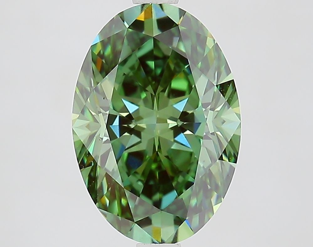 Loose Diamond - OVAL 3.09ct Fancy Vivid Green VVS2: Loose Diamond - OVAL 3.09ct Fancy Vivid Green VVS2 Source: This is a real non-mined Diamond that has been grown in a lab Shape: OVAL Carats: 3.09 Color: Fancy Vivid Green Certification: IGI Video: