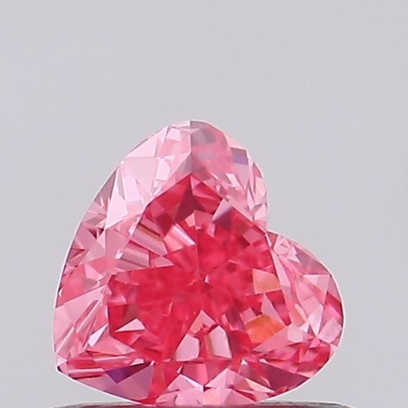 Loose Diamond - HEART 0.47ct Fancy Vivid Pink VVS2: Loose Diamond - HEART 0.47ct Fancy Vivid Pink VVS2 Source: This is a real non-mined Diamond that has been grown in a lab Shape: HEART Carats: 0.47 Color: Fancy Vivid Pink Certification: IGI Video: