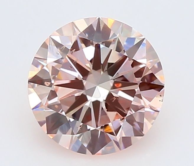 Ideal Loose Diamond - ROUND 0.9ct Fancy Pink VS2: Ideal Loose Diamond - ROUND 0.9ct Fancy Pink VS2 Source: This is a real non-mined Diamond that has been grown in a lab Shape: ROUND Carats: 0.9 Color: Fancy Pink Certification: IGI Video: