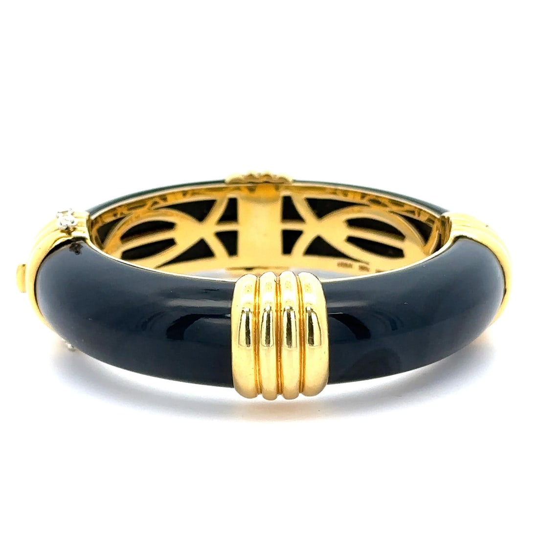 Vintage Van Cleef & Arpels 18K Yellow Gold Hinged Bangle Bracelet with Black Stones: Vintage Van Cleef & Arpels 18K Yellow Gold Hinged Bangle Bracelet with Black Stones This stunning vintage hinged bangle bracelet from Van Cleef & Arpels features a luxurious design crafted from solid 