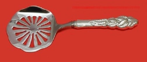 Tiffany and Co Ailanthus Sterling Silver Tomato Server 8 Inch: Tiffany and Co Ailanthus Sterling Silver Tomato Server 8 Inch This exquisite tomato server is a stunning piece from the Ailanthus pattern by Tiffany and Co. Crafted from high-quality sterling silver, 