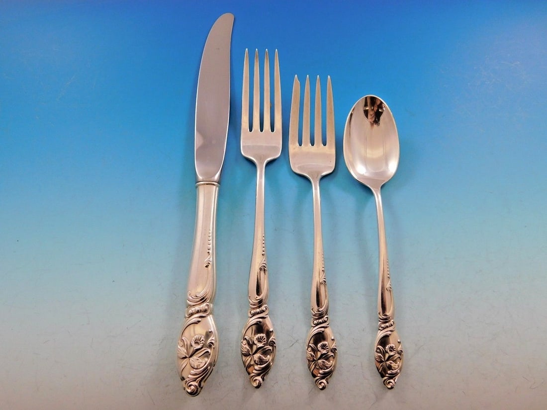Westmorland Enchanting Orchid Sterling Silver 4-Piece Place Setting: Westmorland Enchanting Orchid Sterling Silver 4-Piece Place Setting This exquisite 4-piece place setting features the enchanting "Enchanting Orchid" pattern by Westmorland, crafted from high-quality s