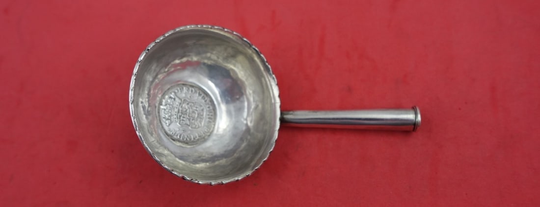 1748 Coin Silver Claret Ladle with Wooden Handle: 1748 Coin Silver Claret Ladle with Wooden Handle This exquisite claret ladle is crafted from coin silver and features a wooden handle, dated 1748. Measuring 13 1/2" in length, this piece showcases the