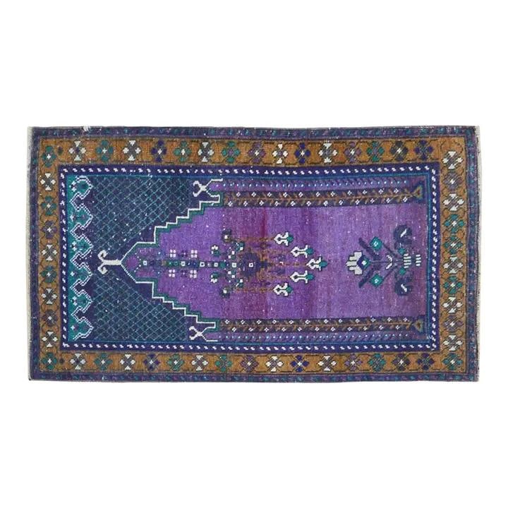 Hand-Knotted Wool Anatolian Rug in Purple 2'3" x 4': Hand-Knotted Wool Anatolian Rug in Purple 2'3" x 4' This vintage Turkish Anatolian rug is hand-knotted from wool using traditional techniques. Its rich purple color and textured surface combine classi