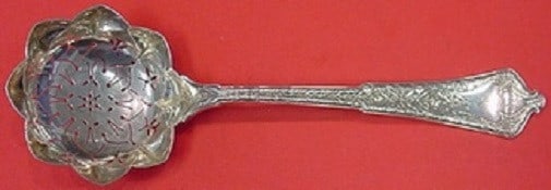 Tiffany & Co. Persian Sterling Silver Sugar Sifter Gold Washed 7.25": Tiffany & Co. Persian Sterling Silver Sugar Sifter Gold Washed 7.25" This exquisite sugar sifter from Tiffany & Co. features a beautiful gold washed finish, showcasing the intricate Persian pattern. C