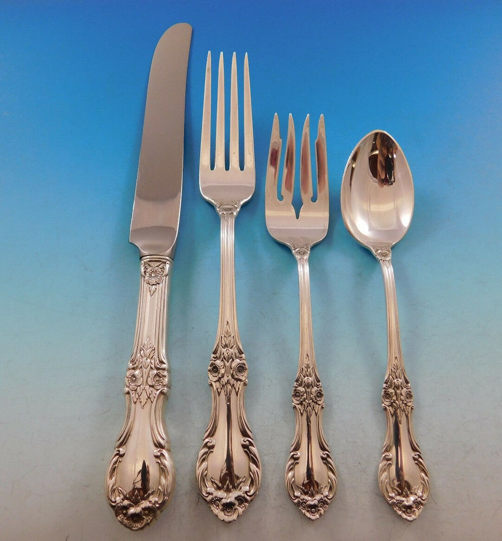 International Silver Wild Rose 4pc Sterling Silver Place Setting: International Silver Wild Rose 4pc Sterling Silver Place Setting Enhance your dining experience with this exquisite Wild Rose place setting by International Sterling. This 4-piece set is crafted from 