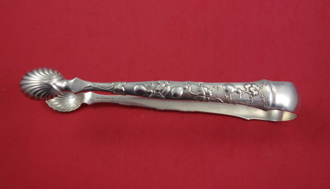 Tiffany & Co. Vine Sterling Silver Sugar Tong 5 7/8 Gourd Motif with Certificate: Tiffany & Co. Vine Sterling Silver Sugar Tong 5 7/8 Gourd Motif with Certificate Discover a stunning piece of craftsmanship with this Vine by Tiffany Sterling Silver Large Sugar Tong, measuring 5 7/8 