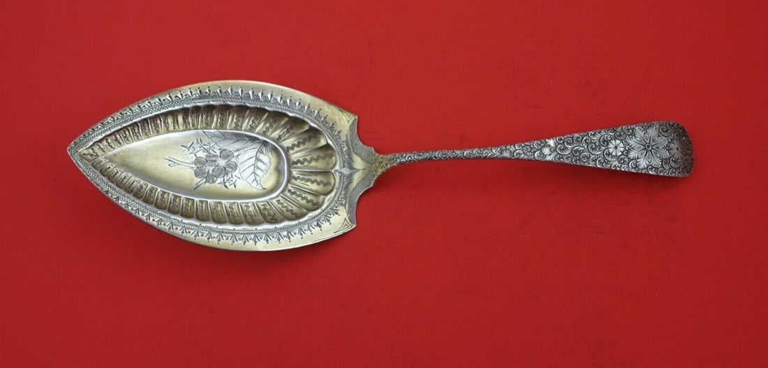 J.E. Caldwell Antique Engraved Sterling Silver Cake Server 10 1/4": J.E. Caldwell Antique Engraved Sterling Silver Cake Server 10 1/4" This exquisite cake server features the Antique Engraved pattern by J.E. Caldwell, crafted from fine sterling silver. The server boas