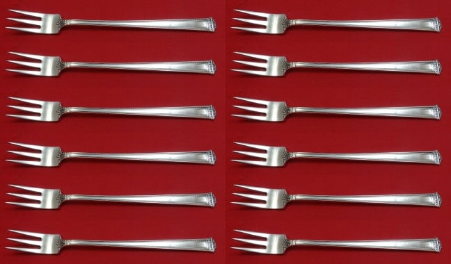 International Sterling Silver Pantheon Cocktail Fork Set 12 Pieces 5": International Sterling Silver Pantheon Cocktail Fork Set 12 Pieces 5" Enhance your dining experience with this exquisite 12-piece cocktail fork set from the Pantheon pattern by International Sterling.