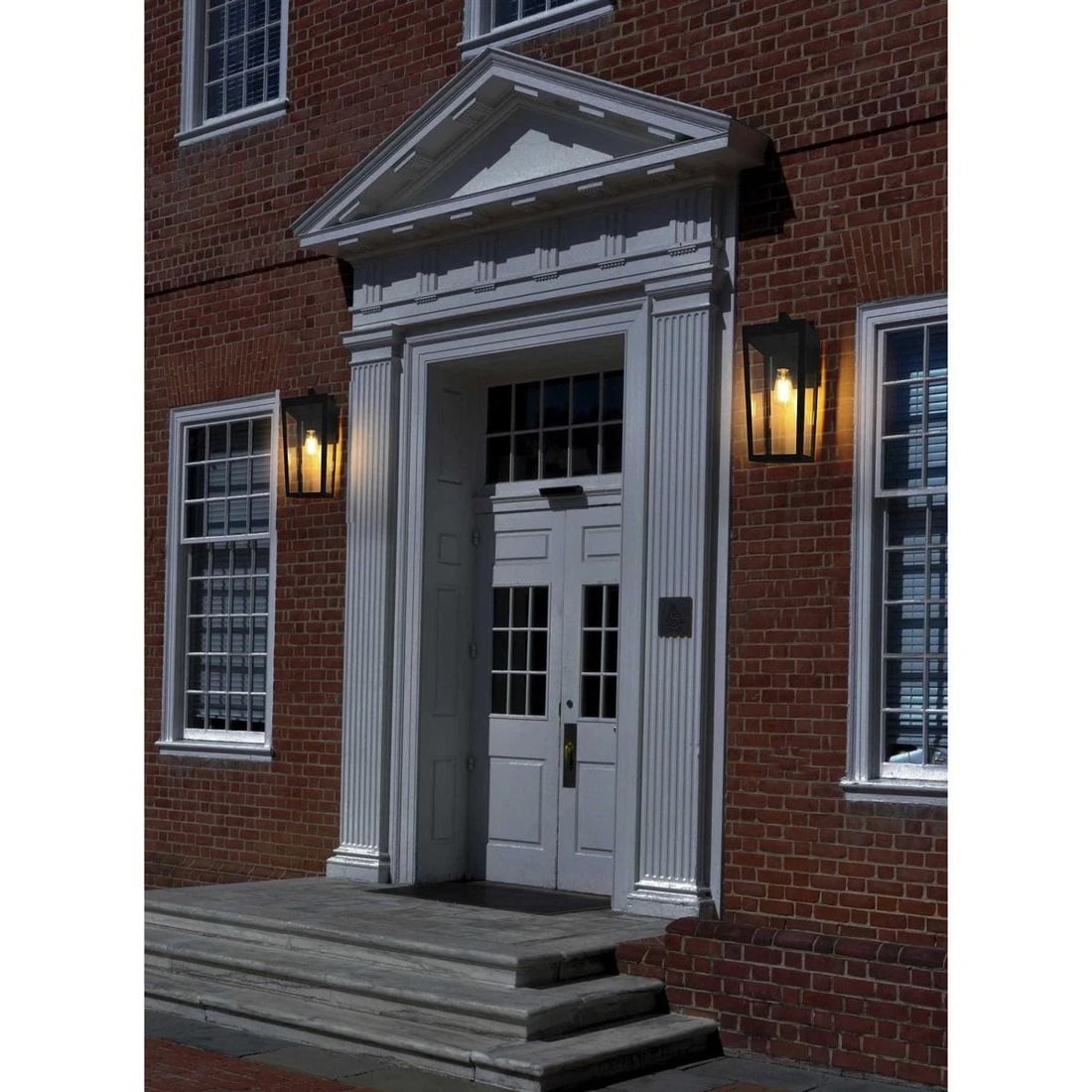William Black Iron Glass Wall Lantern 18 inch Outdoor Light: William Black Iron Glass Wall Lantern 18 inch Outdoor Light This outdoor wall sconce features a classic black finish and is constructed from durable iron and clear glass, making it both waterproof and
