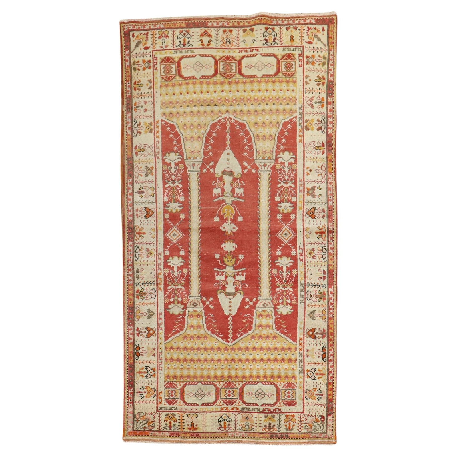 Hand Knotted Wool Turkish Prayer Rug with Column Scroll Motif: Hand Knotted Wool Turkish Prayer Rug with Column Scroll Motif This mid-20th century Turkish prayer rug features a double column scroll prayer motif on a deep red ground, complemented by an ivory borde