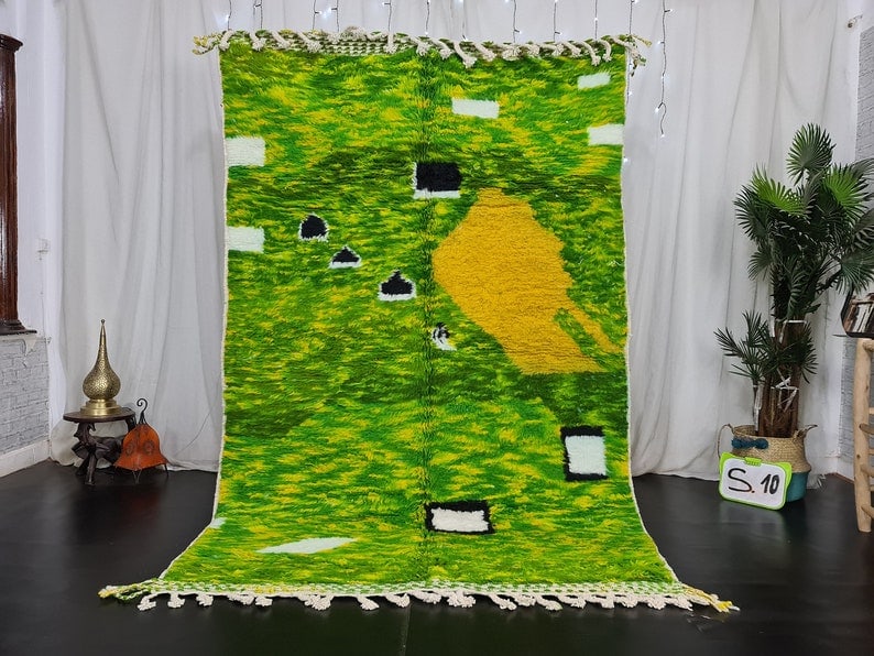 Authentic Handmade Green Moroccan Berber Wool Rug 8 x 5 Feet: Authentic Handmade Green Moroccan Berber Wool Rug 8 x 5 Feet Experience the beauty of authentic craftsmanship with this stunning green handwoven Moroccan Berber wool rug. Expertly crafted by local Ber