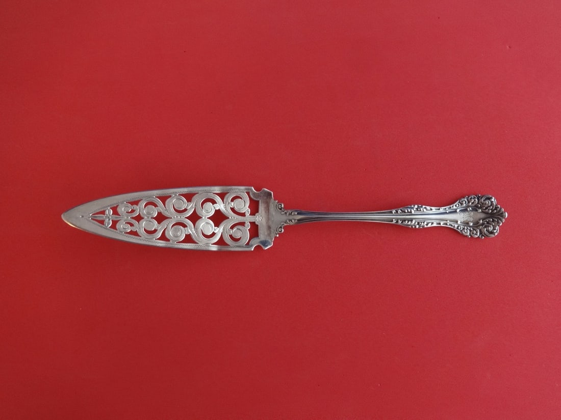 Alvin Florentine Sterling Silver Pierced Jelly Cake Knife 8 5/8": Alvin Florentine Sterling Silver Pierced Jelly Cake Knife 8 5/8" Introducing the Florentine by Alvin Sterling Silver Jelly Cake Knife, an exquisite piece crafted from high-quality sterling silver. Thi