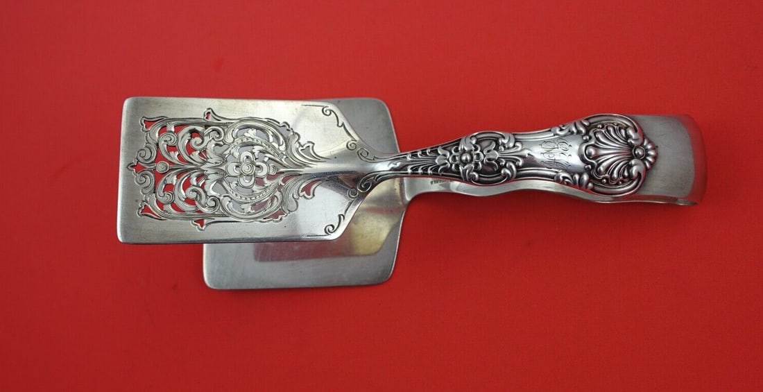 Tiffany & Co English King Sterling Silver Asparagus Serving Tong 7.25": Tiffany & Co English King Sterling Silver Asparagus Serving Tong 7.25" Introducing the exquisite English King Asparagus Serving Tong by Tiffany & Co., a stunning piece crafted from high-quality sterli