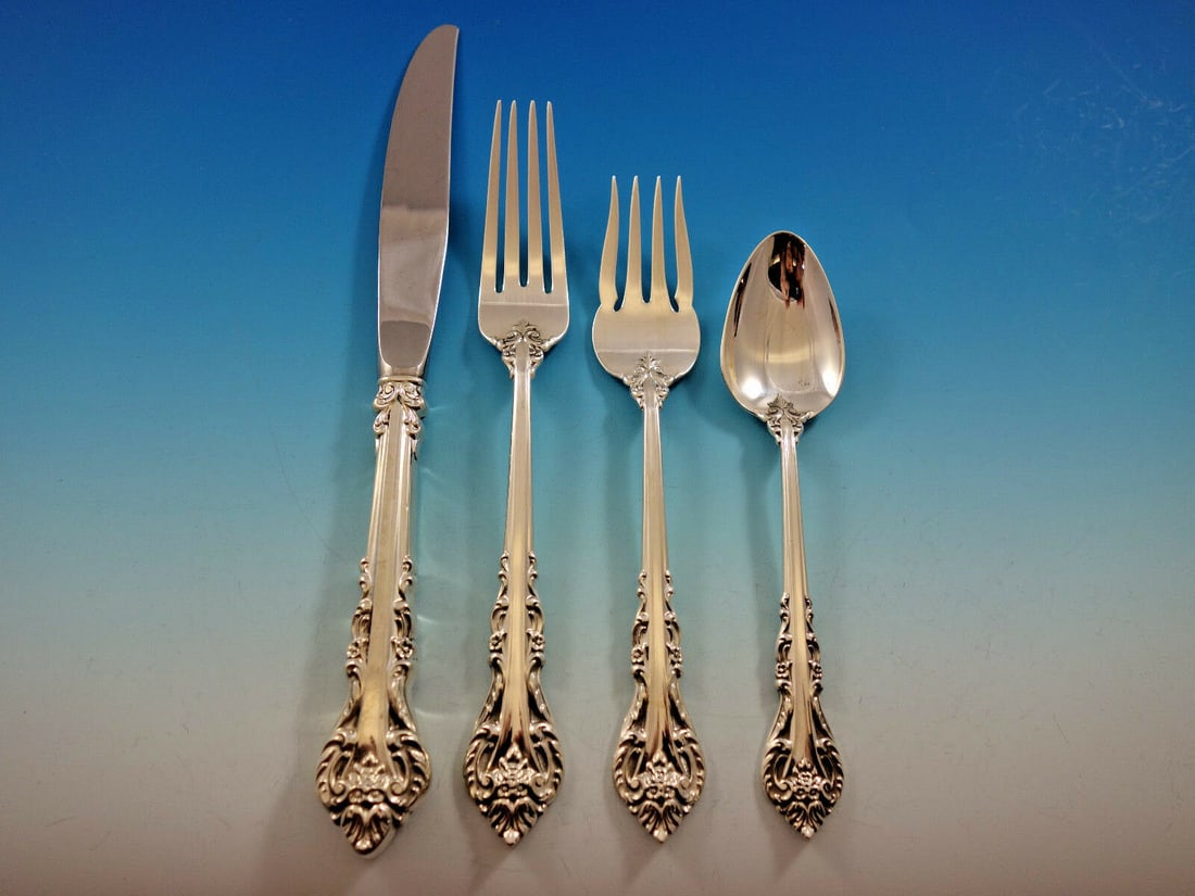 Masterpiece International Sterling Silver 4-Piece Place Setting: Masterpiece International Sterling Silver 4-Piece Place Setting Enhance your dining experience with this exquisite 4-piece place setting by Masterpiece, crafted from high-quality sterling silver. This