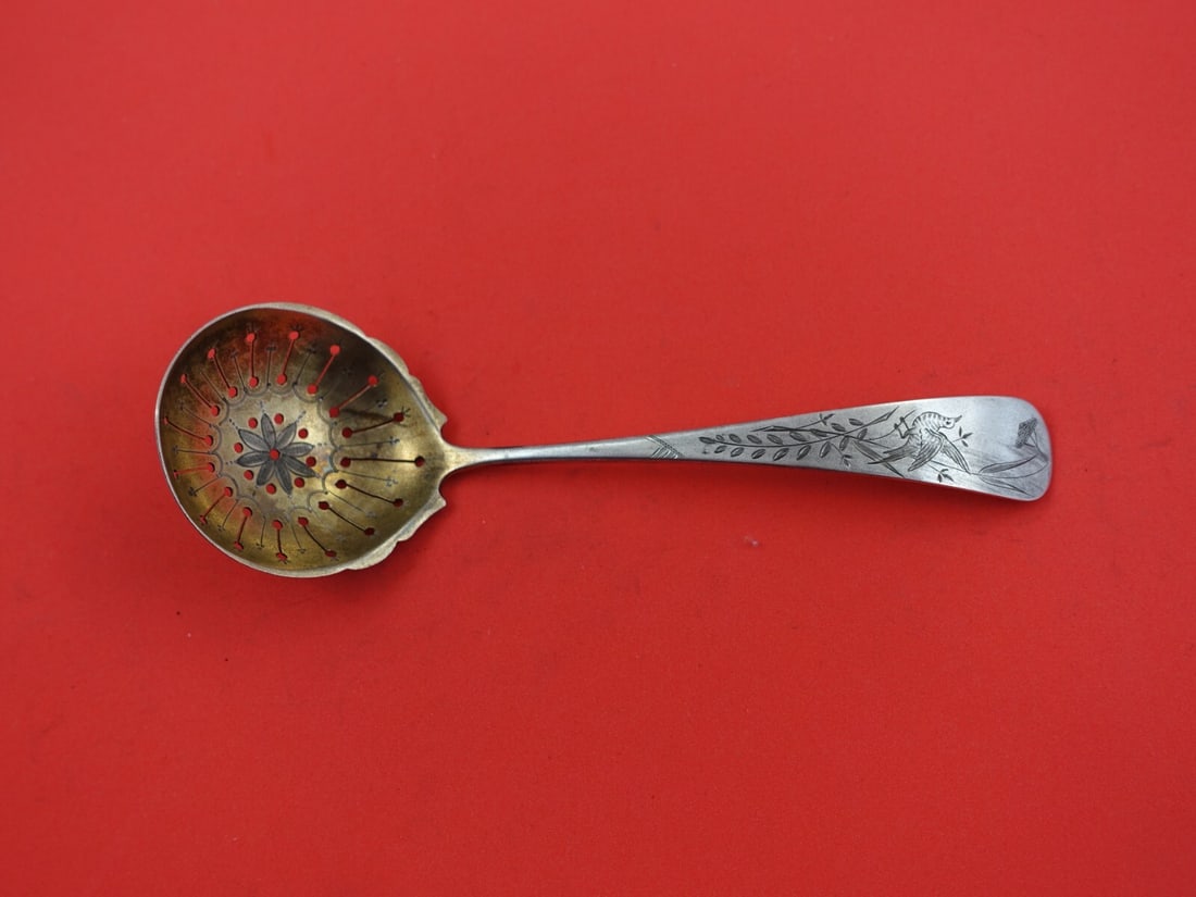 Bird Pattern Sterling Silver Sugar Sifting Ladle 7 Inch Gold Wash: Bird Pattern Sterling Silver Sugar Sifting Ladle 7 Inch Gold Wash This exquisite 7-inch sterling silver sugar sifting ladle features a charming Bird pattern by an unknown maker. Crafted with a bright-