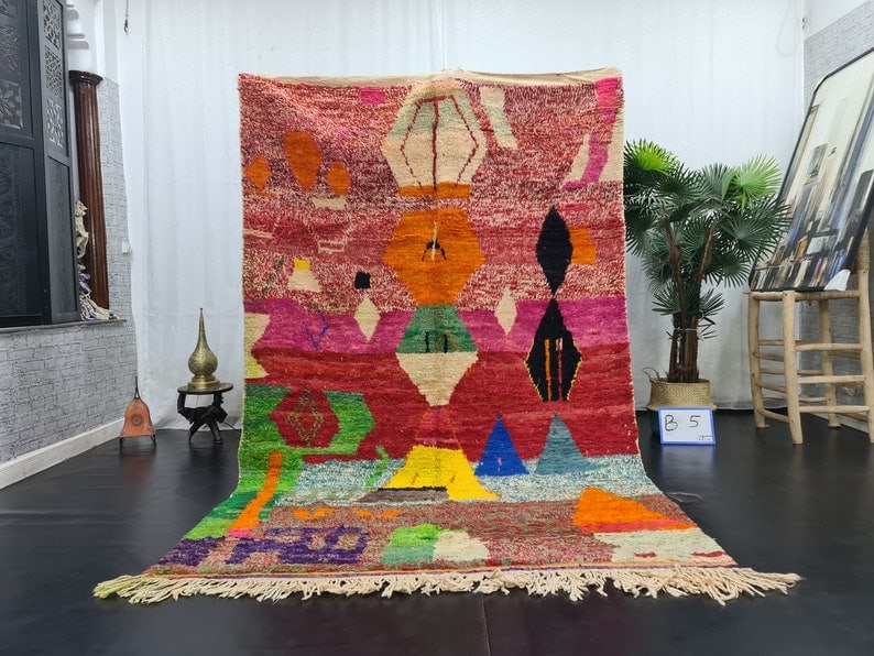Handmade Moroccan Berber Wool Area Rug 10 x 5 ft: Handmade Moroccan Berber Wool Area Rug 10 x 5 ft Enhance your space with this stylish and soft handmade Moroccan Berber wool area rug. This exquisite rug is meticulously handwoven by local Berber wome