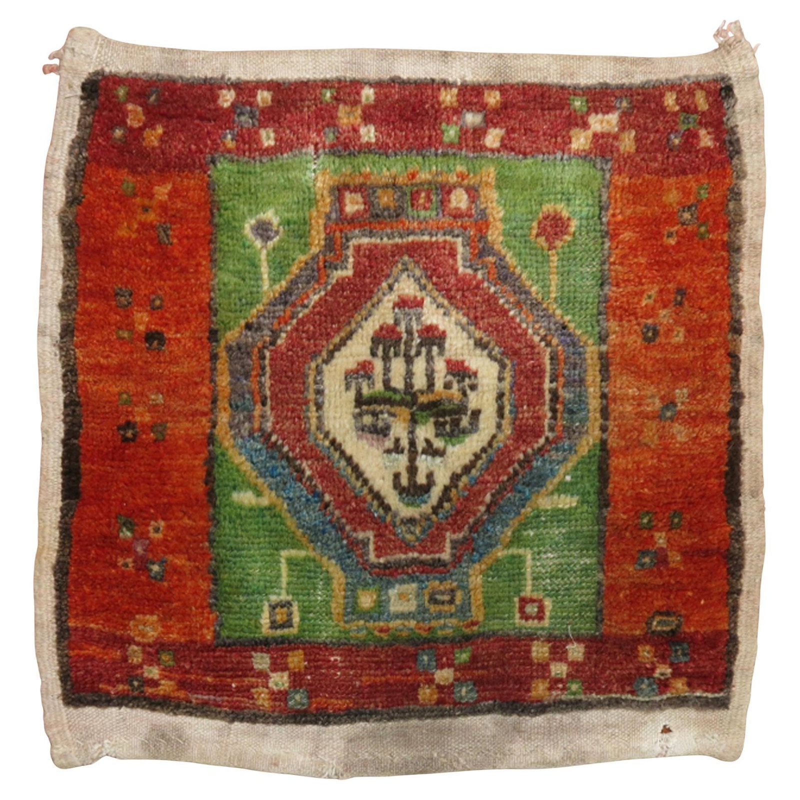 Green Wool Anatolian Yastik Rug Hand-Knotted Turkish Vintage 1940s 1'7 x 1'8: Green Wool Anatolian Yastik Rug Hand-Knotted Turkish Vintage 1940s 1'7 x 1'8 This vintage Anatolian Turkish Yastik mini throw rug features a predominantly green color palette. Hand-knotted from wool, 
