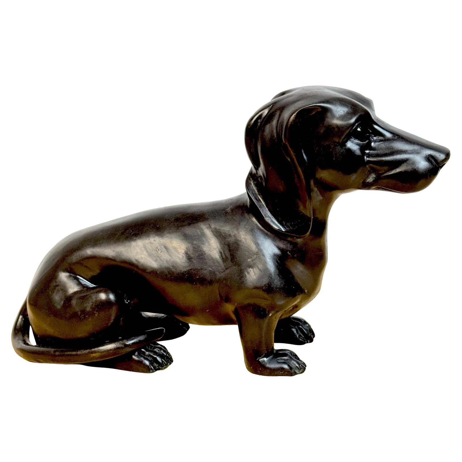 French School Patinated Bronze Dachshund Sculpture 20th Century: French School Patinated Bronze Dachshund Sculpture 20th Century This exquisite French School patinated bronze sculpture of a resting dachshund captures the breed's charm and elegance with remarkable d