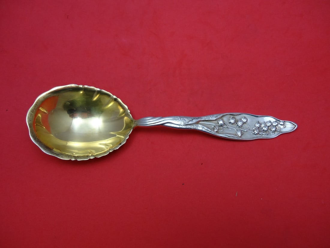 Whiting Sterling Silver Berry Spoon Lily of the Valley Gold Wash 8.5": Whiting Sterling Silver Berry Spoon Lily of the Valley Gold Wash 8.5" This exquisite berry spoon features the elegant "Lily of the Valley" pattern by Whiting, crafted from high-quality sterling silver