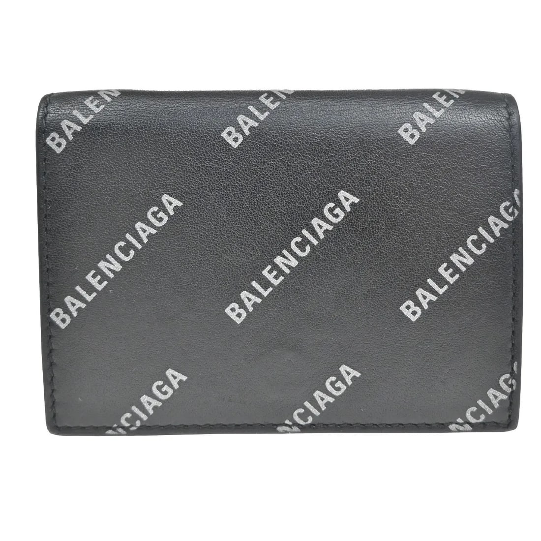 Balenciaga Trifold Wallet Black Leather Unisex Made in Italy: Balenciaga Trifold Wallet Black Leather Unisex Made in Italy This unisex Balenciaga trifold wallet is crafted from black leather and features a compact design suitable for everyday use. It shows signs