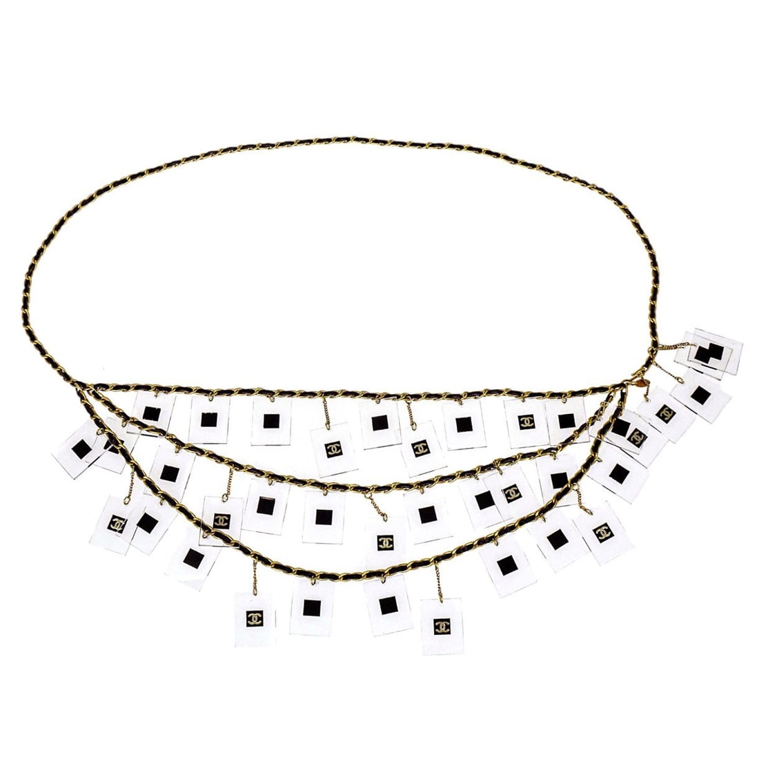 Chanel 94A waist belt black leather chain with acrylic charms: Chanel 94A waist belt black leather chain with acrylic charms Vintage Chanel waist belt featuring a black leather strap with a gold-plated chain and square acrylic logo charms. This women's belt is ma