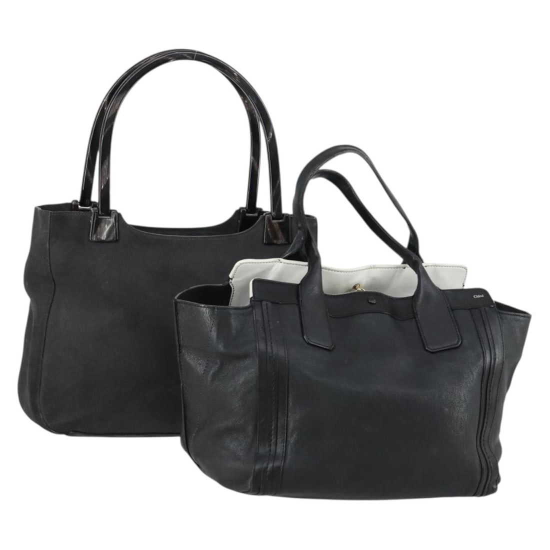 Chloe Black Leather Hand Bag Set of 2 Authentic: Chloe Black Leather Hand Bag Set of 2 Authentic This stylish Chloe handbag set features two pieces crafted from high-quality leather in a classic black color. The exterior showcases signs of wear incl