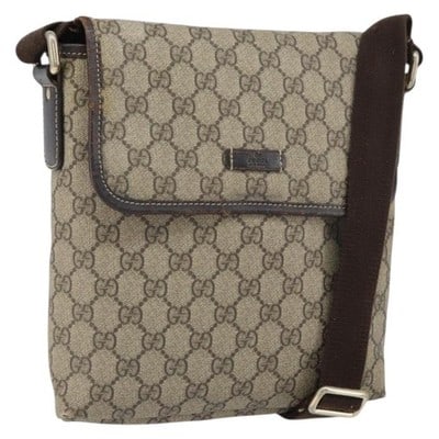 Gucci 223666 GG Supreme Beige PVC Canvas Shoulder Bag: Gucci 223666 GG Supreme Beige PVC Canvas Shoulder Bag Authentic Gucci GG Supreme shoulder bag in beige with a PVC leather and GG canvas construction. Made in Italy, this compact shoulder bag features 