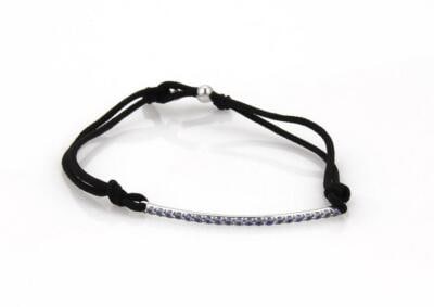 Tiffany & Co. Metro Iolite 18k White Gold Bar Bracelet with Black Cord: Tiffany & Co. Metro Iolite 18k White Gold Bar Bracelet with Black Cord Discover the elegance of this authentic Tiffany & Co. Metro Iolite Bracelet, exquisitely crafted from 18k white gold with a polis