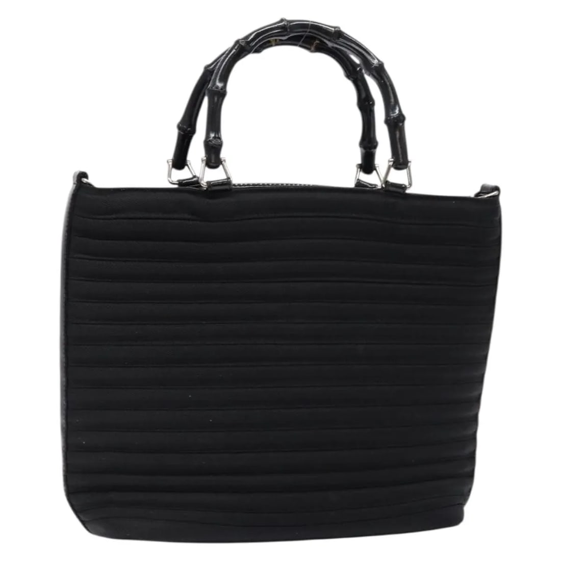 Gucci Black Vintage Nylon Bag with Bamboo Top Handle: Gucci Black Vintage Nylon Bag with Bamboo Top Handle This Gucci Vintage Bamboo Handle Bag is crafted from black nylon and features the iconic bamboo handle design. Designed for women, it originates fr