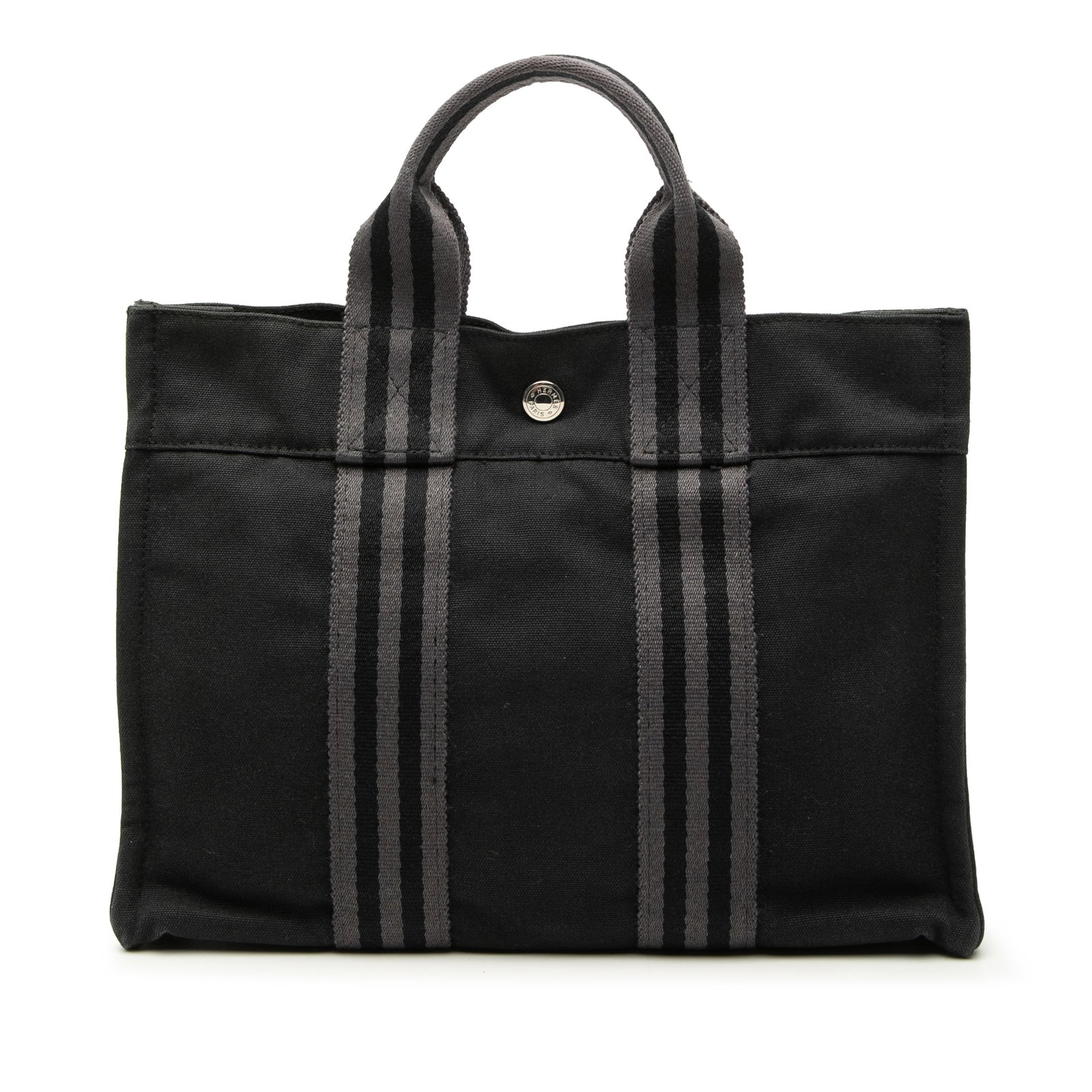 Hermes Fourre Tout PM Black Canvas Tote Bag: Hermes Fourre Tout PM Black Canvas Tote Bag Hermes Fourre Tout PM tote in black canvas with flat straps, an open top with snap closure, and an interior zip compartment. This bag shows visible wear and