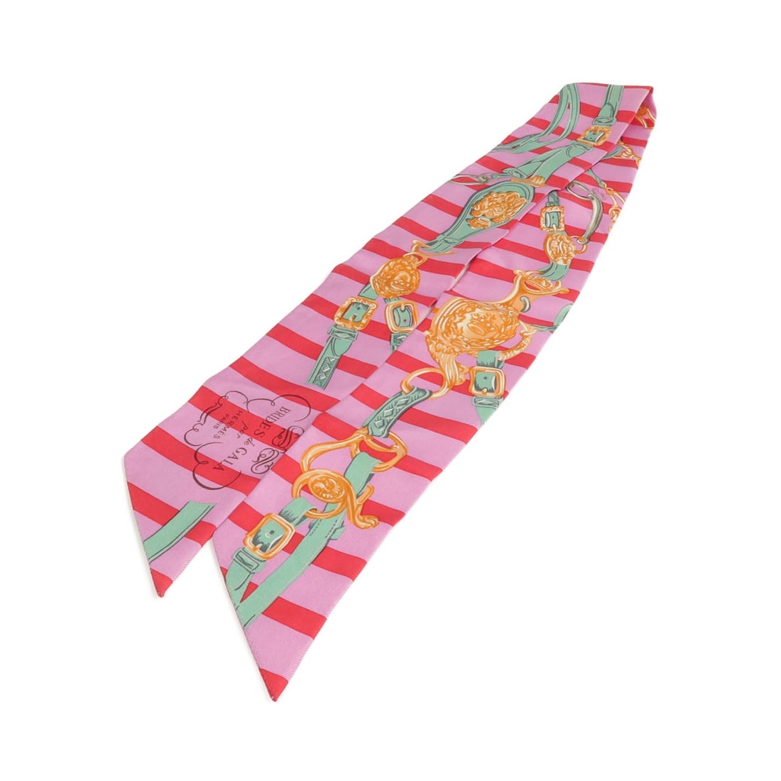 Silk Twilly Scarf by Hermes in Pink and Multicolor: Silk Twilly Scarf by Hermes in Pink and Multicolor This Hermes Twilly scarf is crafted from luxurious silk in a vibrant pink, red, and multicolor design. Made in France, it offers a stylish accessory 