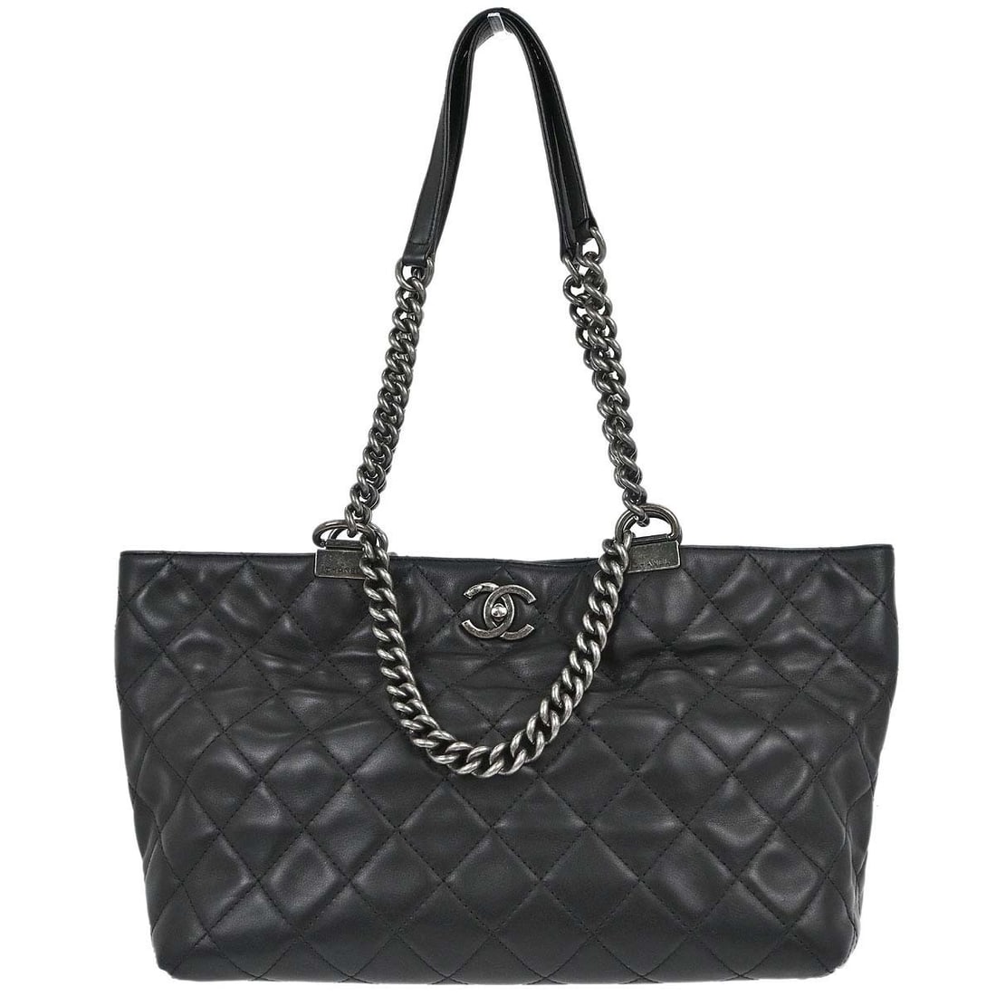 CHANEL Shopping In Chains Large Black Calfskin 2 Way Tote: CHANEL Shopping In Chains Large Black Calfskin 2 Way Tote Chanel Shopping In Chains 2-way tote bag in black calfskin with double handles, a shoulder strap, silver-tone hardware, and multiple pockets. 
