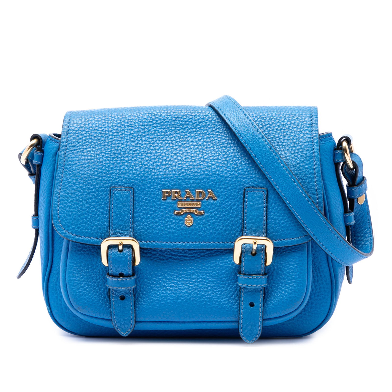 Prada Vitello Daino leather crossbody messenger bag: Prada Vitello Daino leather crossbody messenger bag This Prada Vitello Daino Double Buckle Messenger Bag is crafted from blue leather and features a flat leather strap, a front flap with dual buckle c