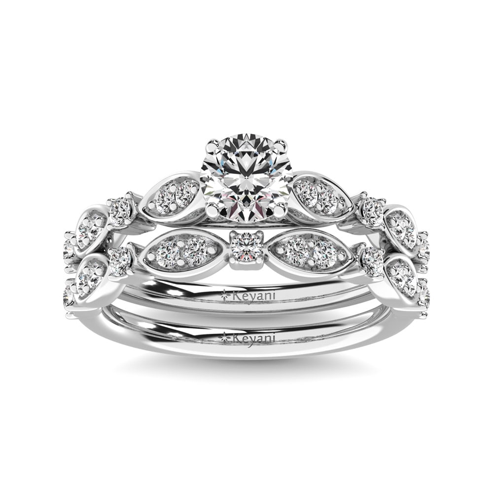 Diamond 1/2 Ct.Tw. Bridal Ring in 14K White Gold: Diamond 1/2 Ct.Tw. Bridal Ring in 14K White Gold 14k White Gold Stone Color: G-h Stone Clarity: Si2 Each ring is presented in standard size 6.5. Complimentary resizing is available between sizes 510 (