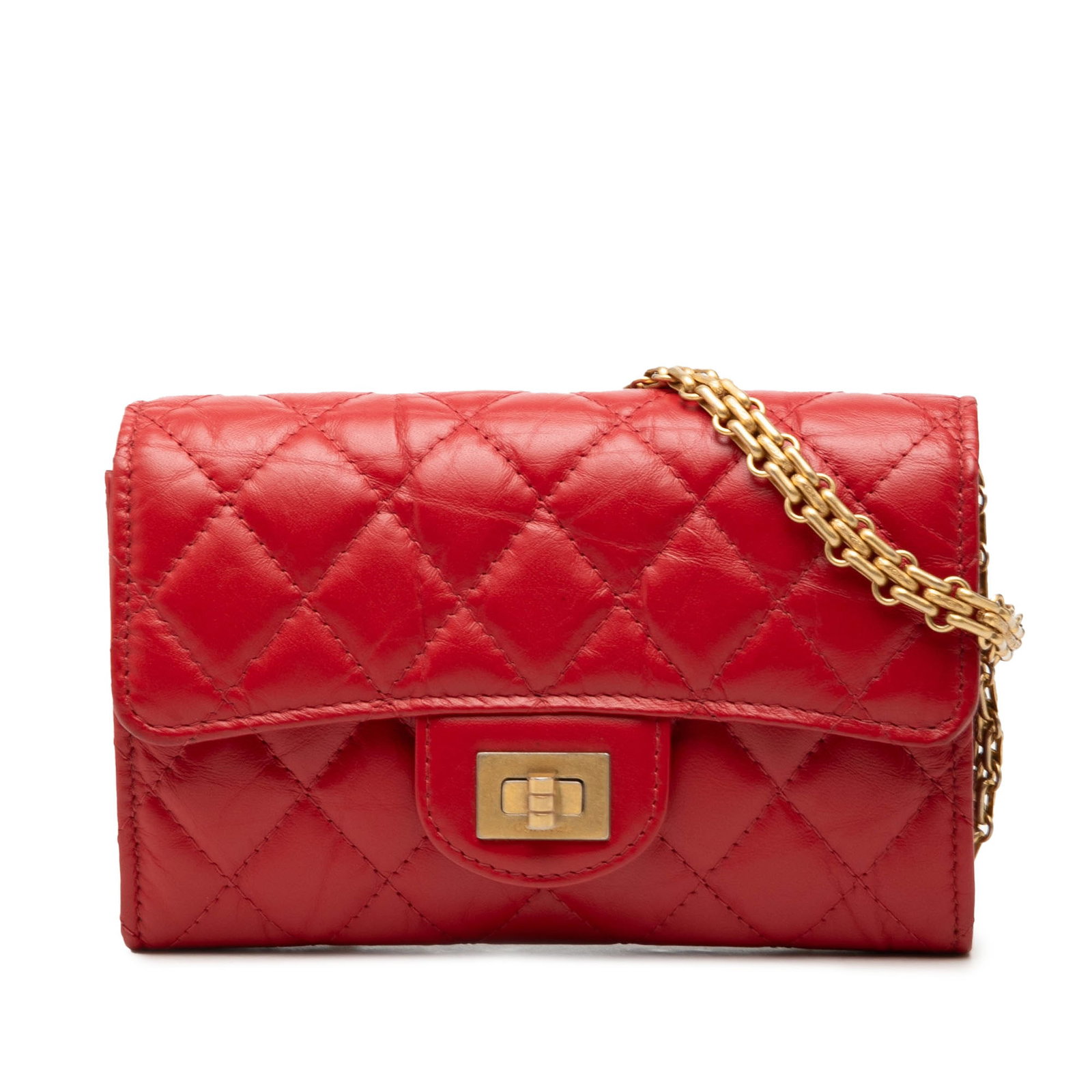 Chanel Reissue 2.55 Quilted Red Leather Chain Clutch Bag: Chanel Reissue 2.55 Quilted Red Leather Chain Clutch Bag Chanel Reissue 2.55 Clutch with Chain in red quilted aged calfskin leather. This bag features a front flap with twist lock closure, a gold tone
