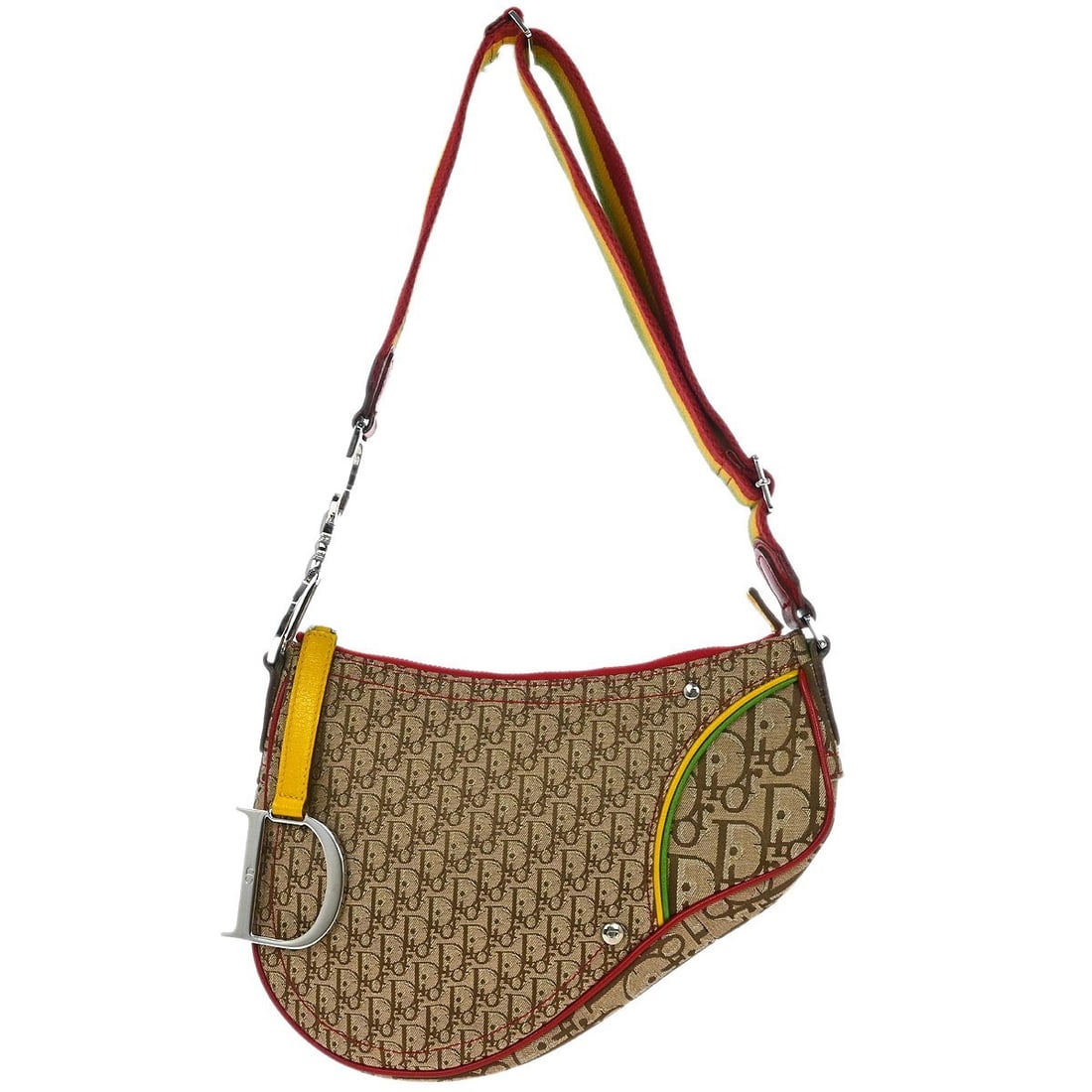 Christian Dior Dior Saddle shoulder bag in Rasta Trotter canvas leather: Christian Dior Dior Saddle shoulder bag in Rasta Trotter canvas leather Christian Dior Rasta-Color Trotter Saddle shoulder bag in beige with red, yellow, and green accents. This medium saddle bag is c