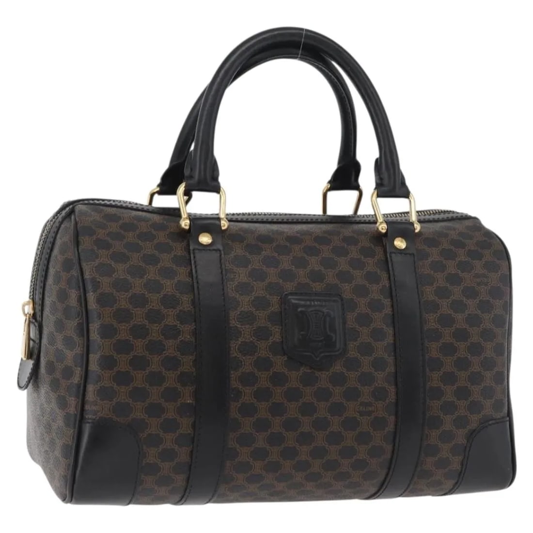 Celine Macadam Canvas Vintage Duffle Bag: Celine Macadam Canvas Vintage Duffle Bag This Celine vintage duffle bag features the iconic Macadam coated canvas in black, complemented by leather accents and metal fittings. Designed for unisex use,