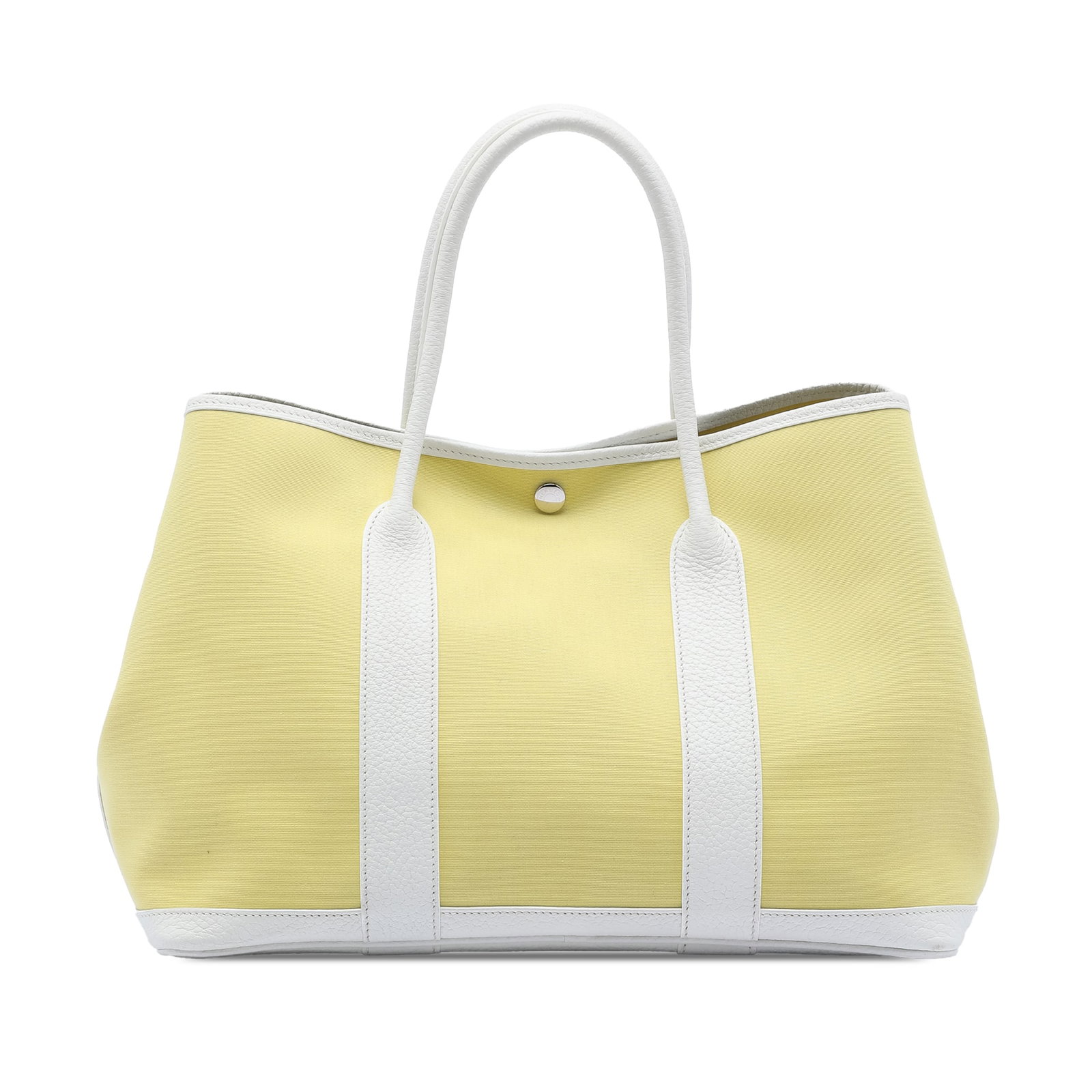 Hermes Garden Party 36 Yellow Canvas and Leather Tote Bag: Hermes Garden Party 36 Yellow Canvas and Leather Tote Bag This Hermes Garden Party 36 bag features a canvas body with textured leather accents, rolled handles, and a top clasp closure. The bag is in o