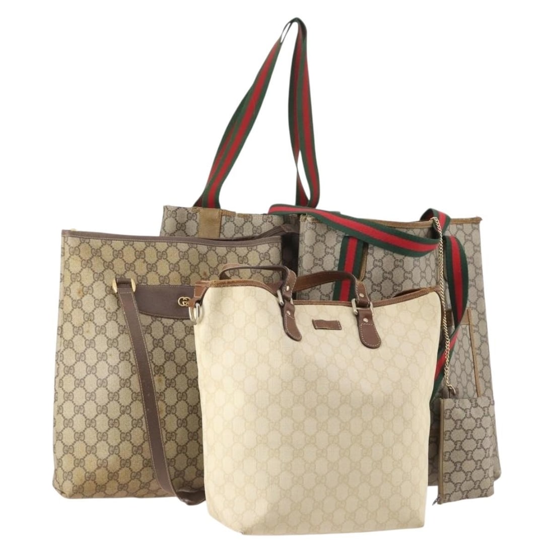 Gucci Sherry Line PVC tote bag special 4-piece set: Gucci Sherry Line PVC tote bag special 4-piece set This is a special set of four GUCCI GG Supreme GG Plus Web Sherry Line tote bags crafted from PVC leather and GG canvas in beige and ivory tones. Mad