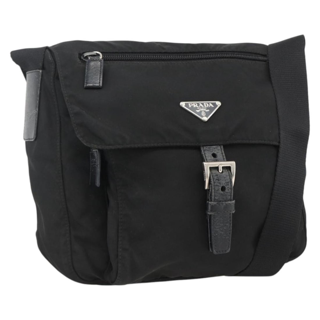 Prada nylon black silver women s shoulder bag Italy: Prada nylon black silver women s shoulder bag Italy This PRADA shoulder bag is crafted from black nylon with silver-tone accents, offering a sleek and versatile design. Made in Italy, it features an a
