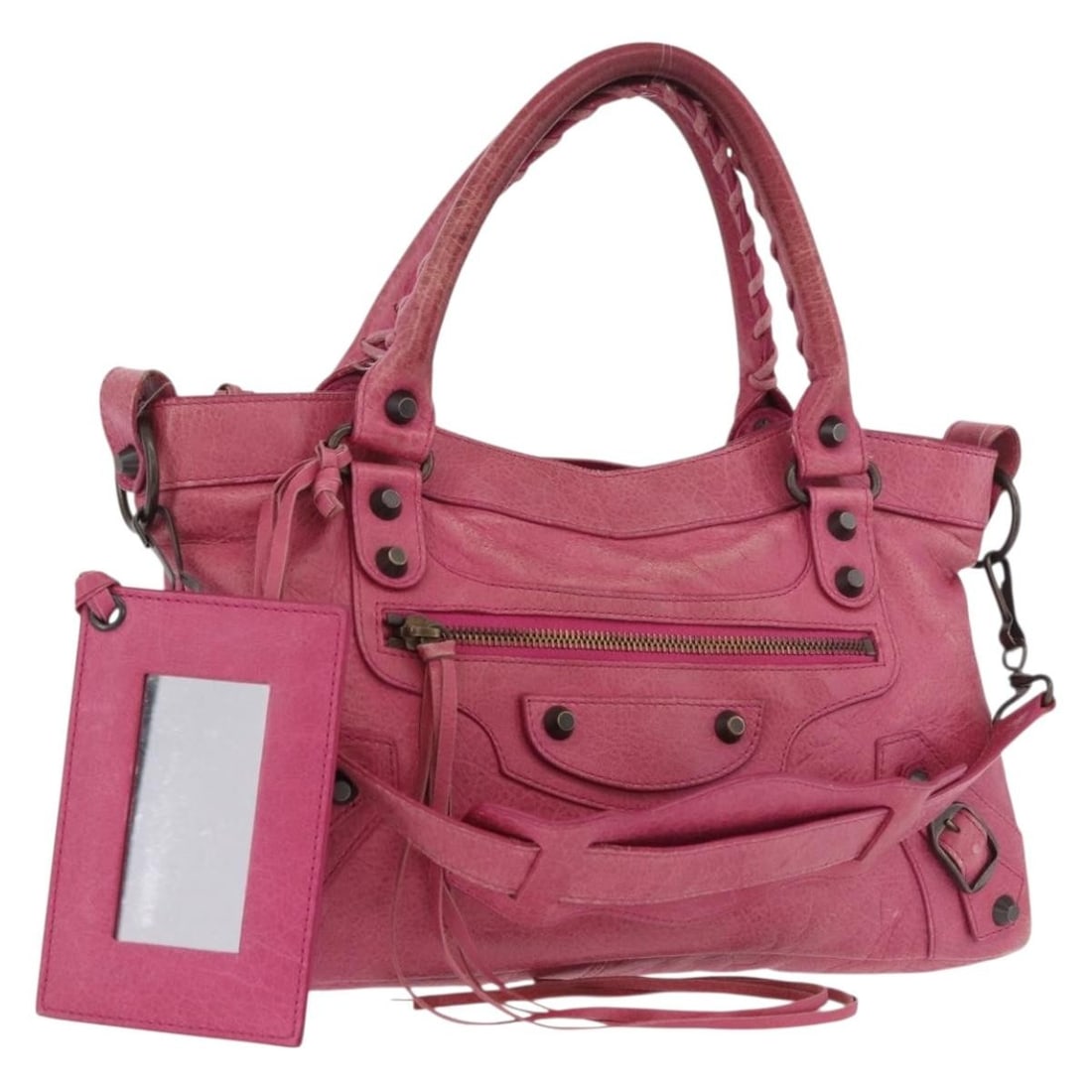Balenciaga 103208 The First pink leather 2way handbag: Balenciaga 103208 The First pink leather 2way handbag Balenciaga The First 2-way handbag in pink leather with a structured silhouette and matching accessories. This women's bag includes a shoulder str